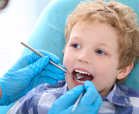Child having dental check up