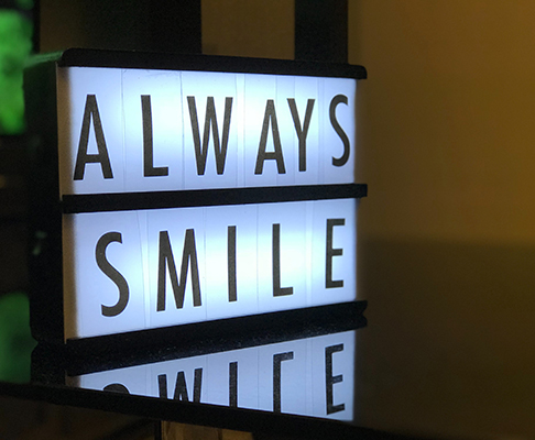 Sign saying always smile