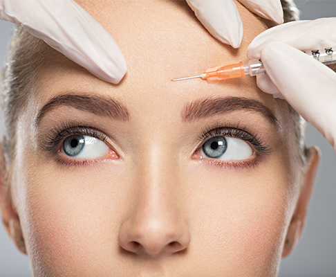 Woman having botox injections