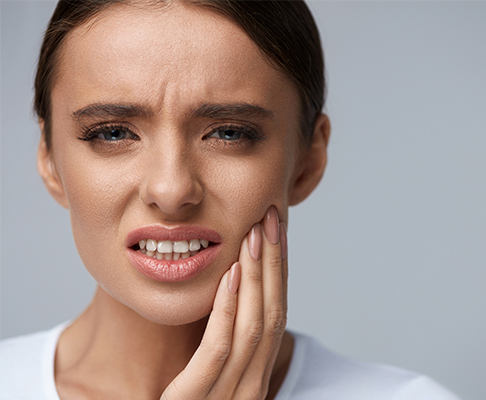 Woman with tooth pain